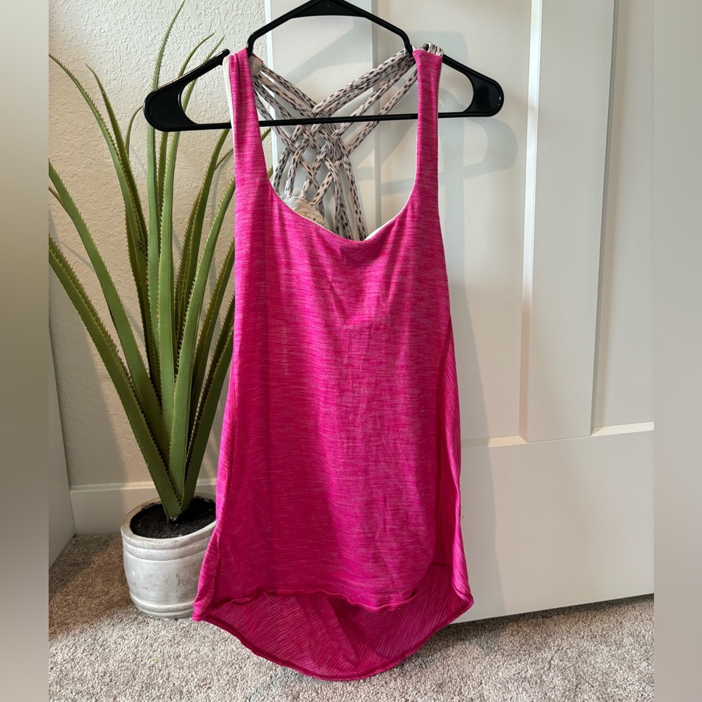 Lululemon Free to be Wild pink tank with built in bra
Size 8